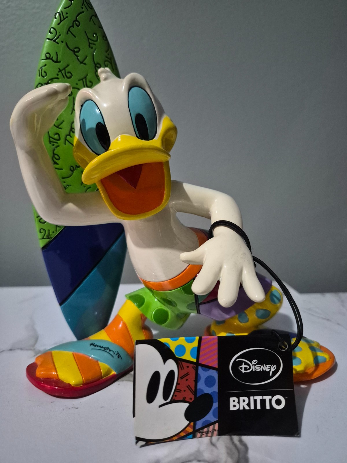 Authentic Disney Showcase by Romero Britto – Donald Duck Surfer Figurine (Large)