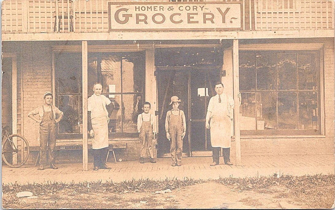 RPPC Oskaloosa Iowa Street Scene Homer & Cory Grocery Store early 1900s RPPC Oskaloosa Iowa Street Scene Homer & Cory Grocery Store early 1900s