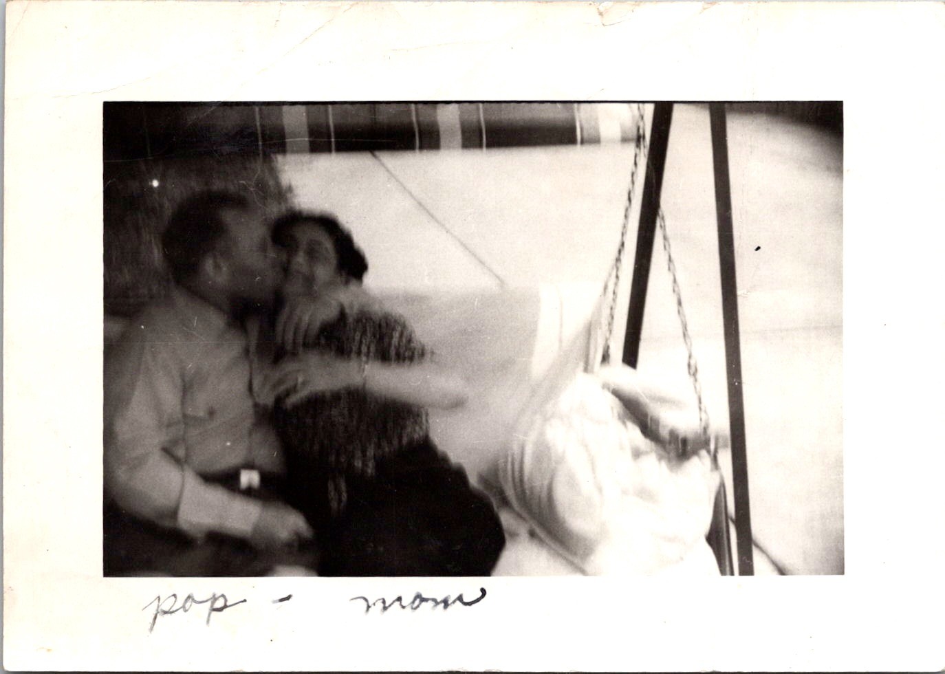 Affectionate Couple Kissing on Porch Swing, 1940s B&W Snapshot Photo Affectionate Couple Kissing on Porch Swing, 1940s B&W Snapshot Photo