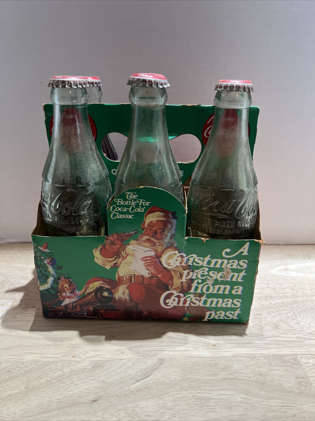 4 Coca Cola Coke 6 fl Pat. D Bottles “A Christmas Present From A Christmas Past” 4 Coca Cola Coke 6 fl Pat. D Bottles “A Christmas Present From A Christmas Past”