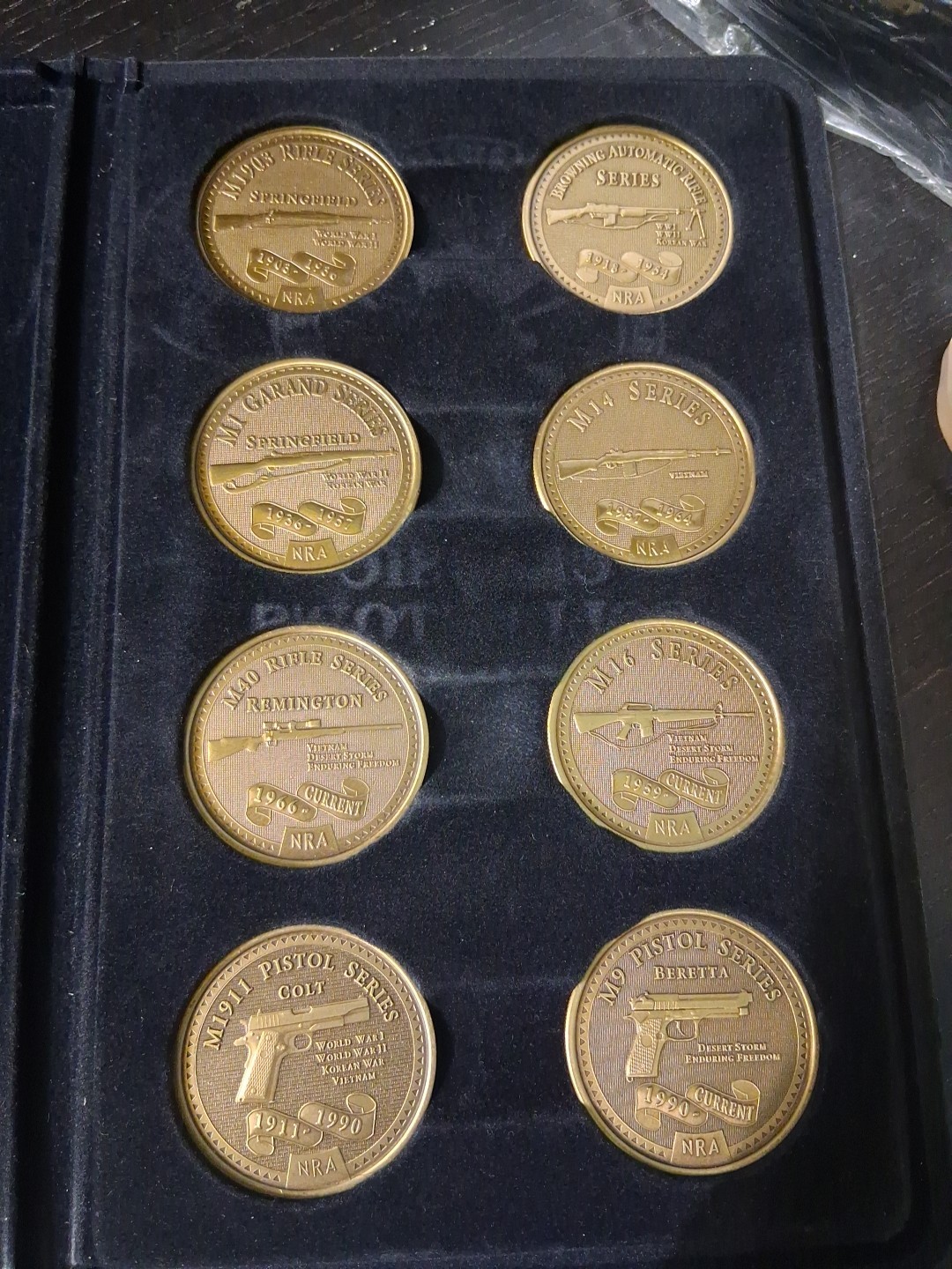 NRA Classic Collector’s Series Medallions –20th Century Military Weapons. 8 Pcs.