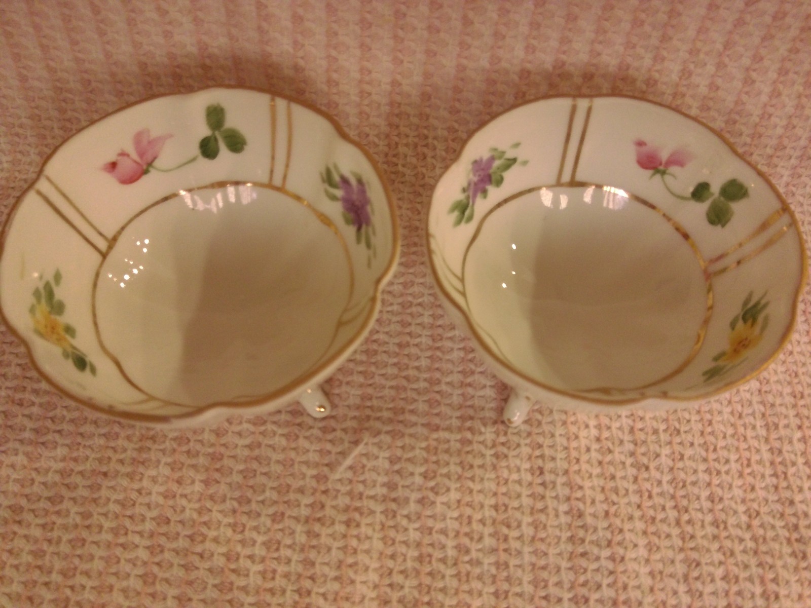 TWO VINTAGE NIPPON HAND PAINTED FLORAL FOOTED SALTS - JAPAN TWO VINTAGE NIPPON HAND PAINTED FLORAL FOOTED SALTS - JAPAN