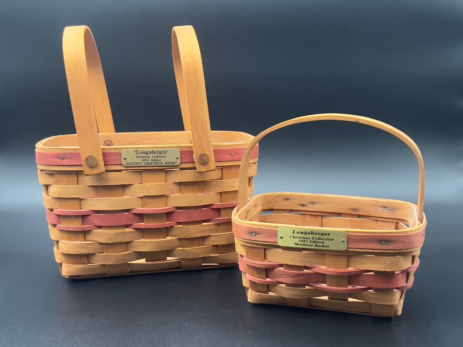 Longaberger Christmas Set Of 2 Baskets Signed as well 1992,1987 dated Longaberger Christmas Set Of 2 Baskets Signed as well 1992,1987 dated