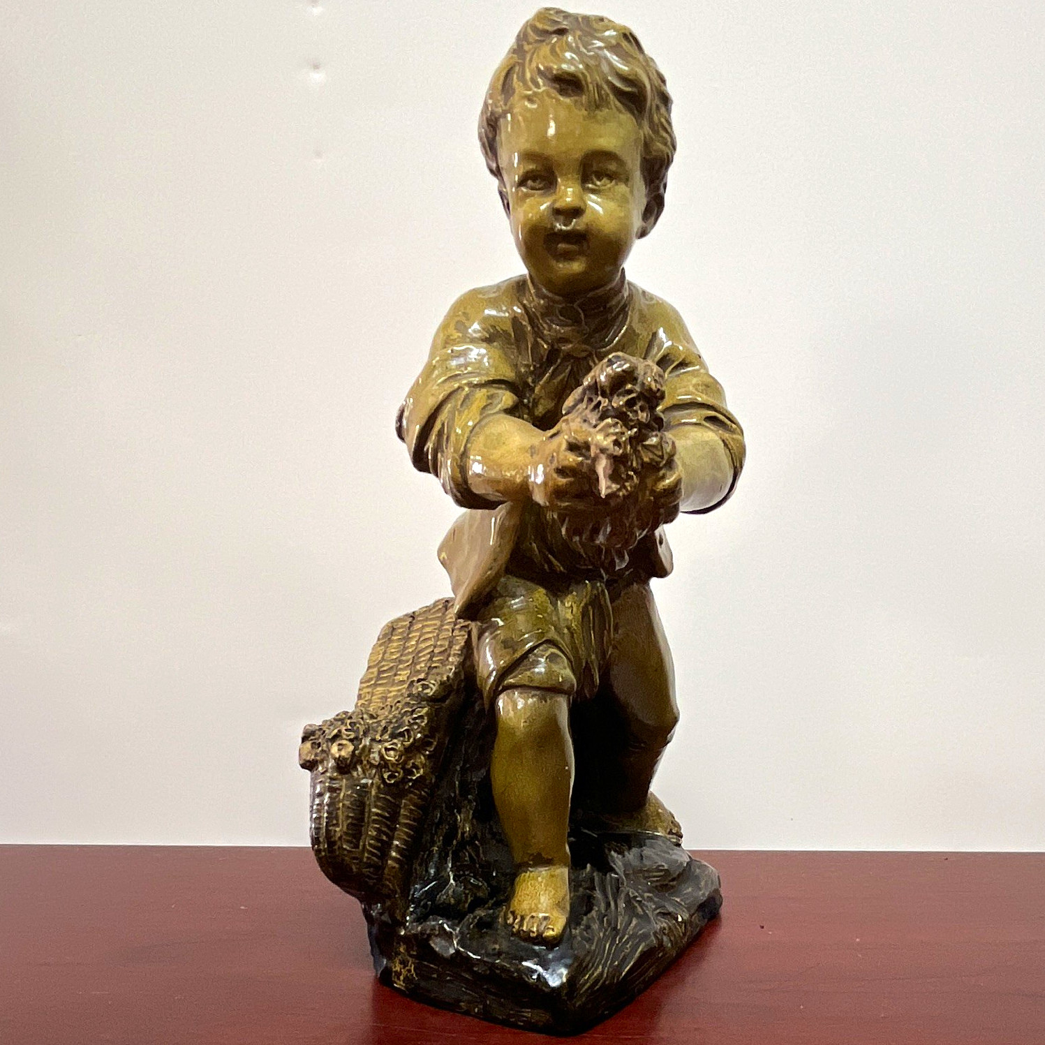 vintage chalkware figurine of a young boy holding flowers, Borhhese
