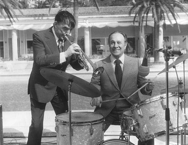 Musician Tino Rossi plays the drums, accompanied by Aime Barell- 1955 Old Photo