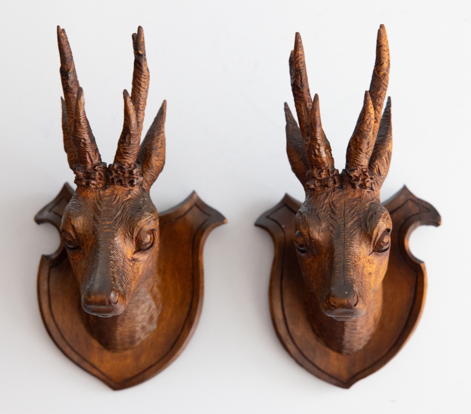 Pair of Antique Black Forest Carved Deer Head Trophy Plaques, Circa 1900