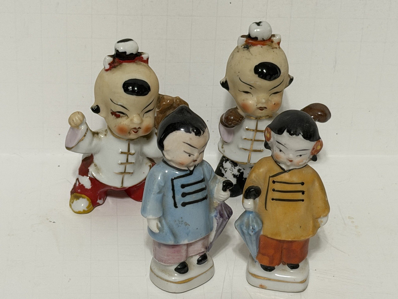 Vintage 4 Figurines  baseball player boy w Umbrella Boxer Japan ceramic figurine