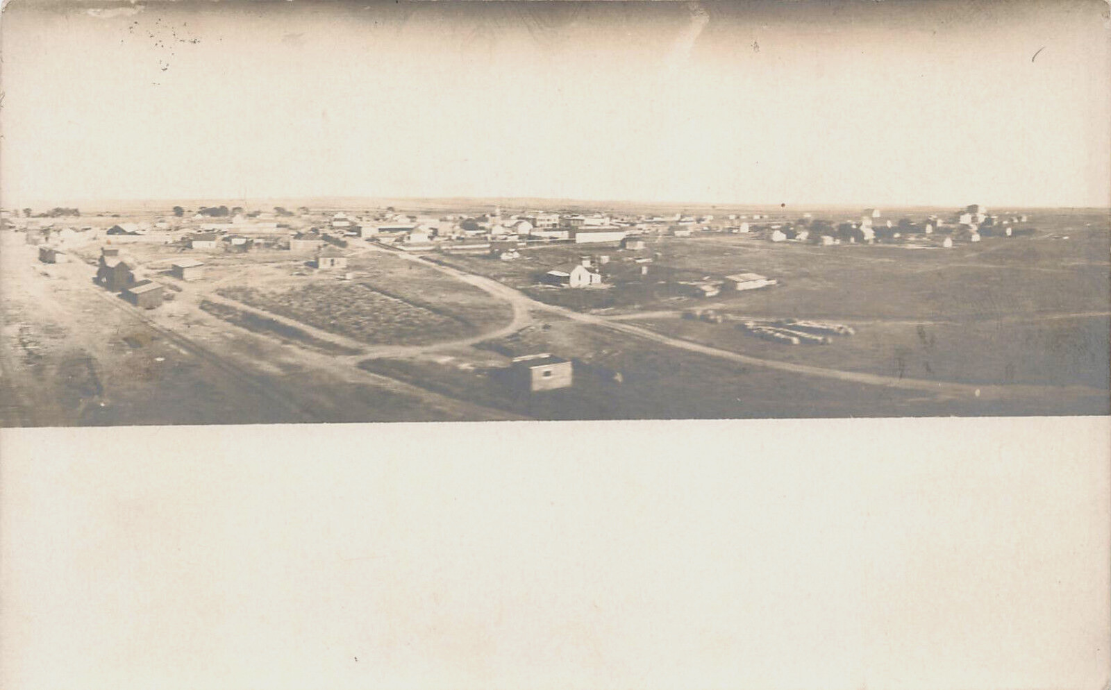 BIRDS EYE VIEW OF TOWN ON FLAT LAND REAL PHOTO POSTCARD MIDWEST 1910 RPPC