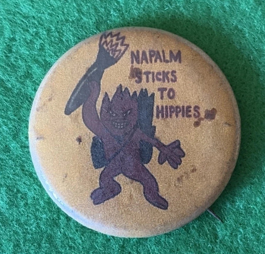 Rare Vietnam War, Large Pin Back Button, “Napalm Sticks Two Hippies” Rare Vietnam War, Large Pin Back Button, “Napalm Sticks Two Hippies”
