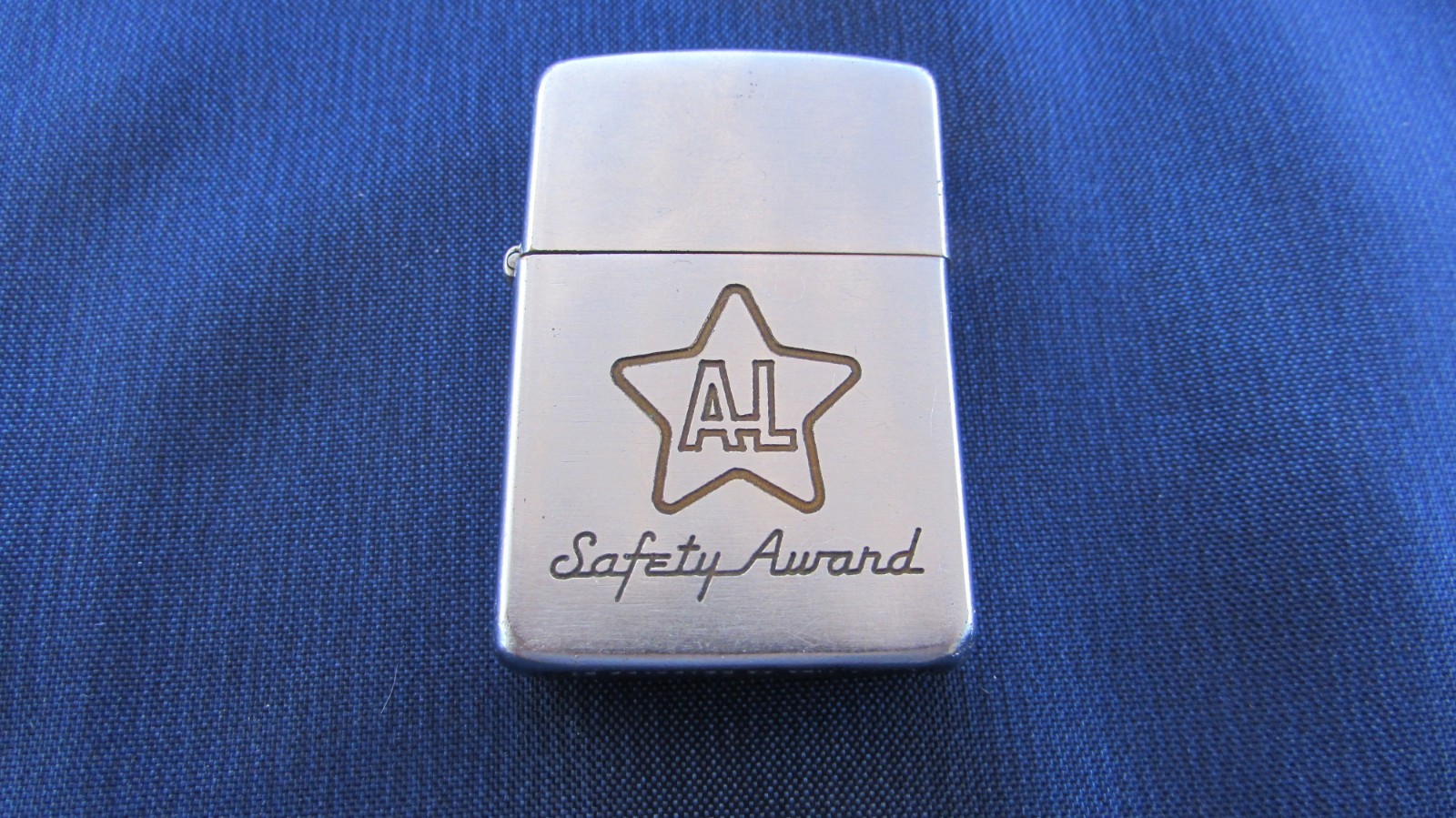 USED VINTAGE 1954-57 ALLEGHENY LUDLUM STEEL SAFETY AWARD ZIPPO LIGHTER USED VINTAGE 1954-57 ALLEGHENY LUDLUM STEEL SAFETY AWARD ZIPPO LIGHTER