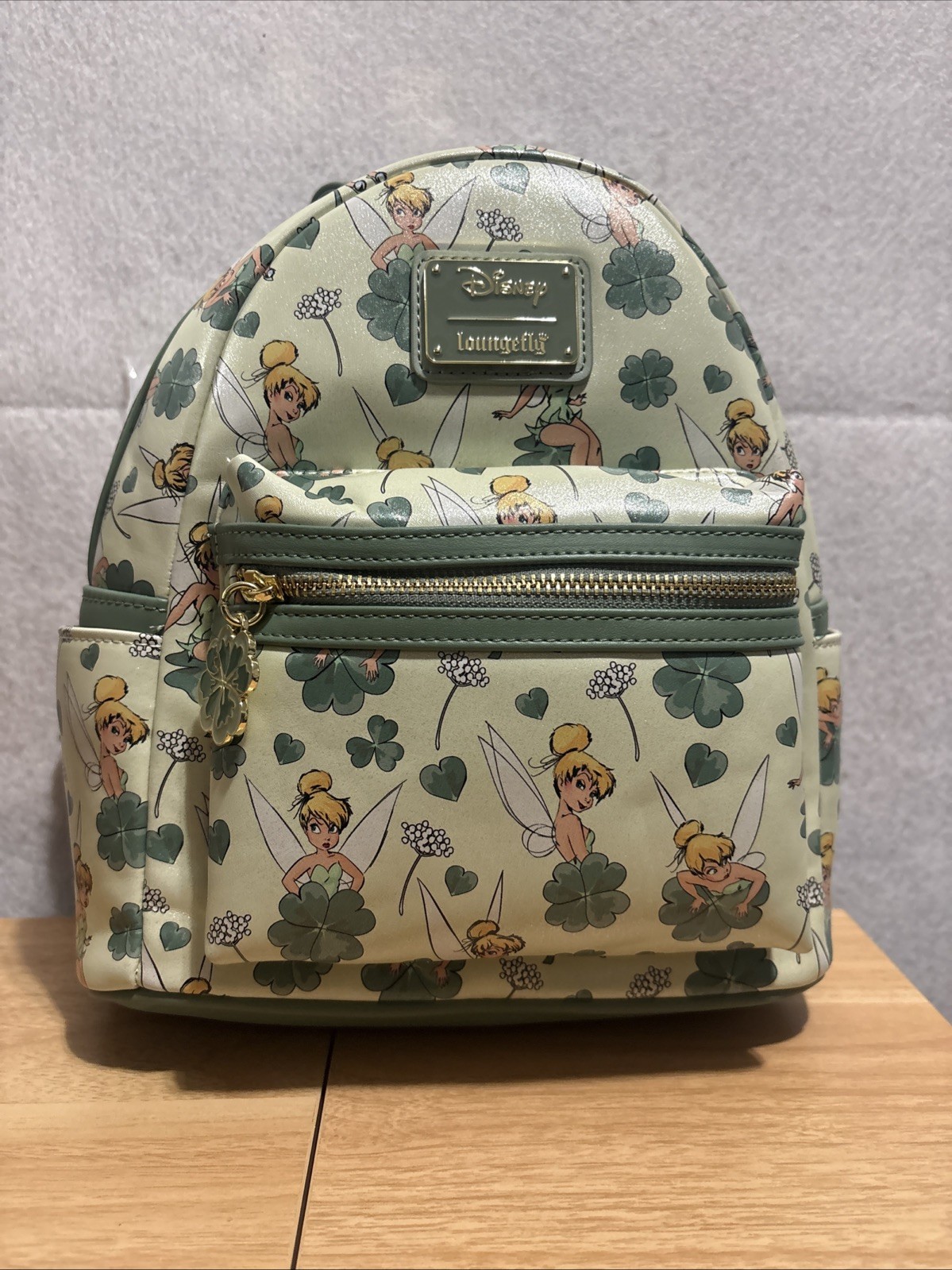 Loungefly Green Disney Peter Pan Tinker Bell Clover All-Over Print Mini Backpack Loungefly Green Disney Peter Pan Tinker Bell Clover All-Over Print Mini Backpack