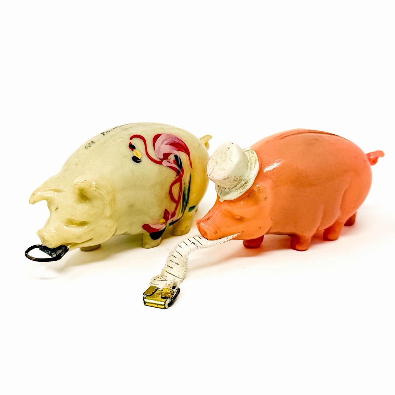 2 Vintage Celluloid Pig Figural Tape Measures Sewing Notions Collectible