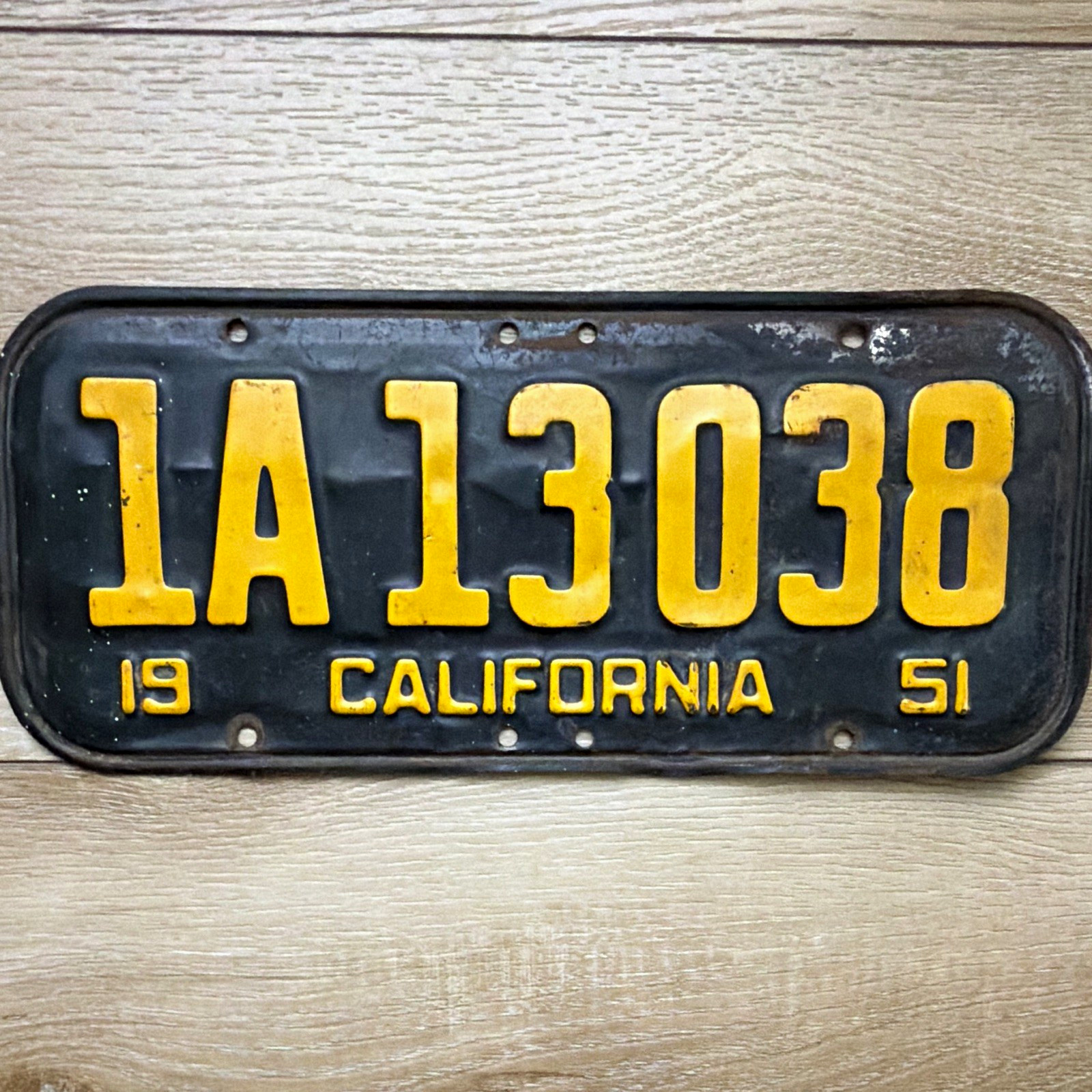 California 1951 License Plate 1A13038 Black Yellow Embossed (19 51)