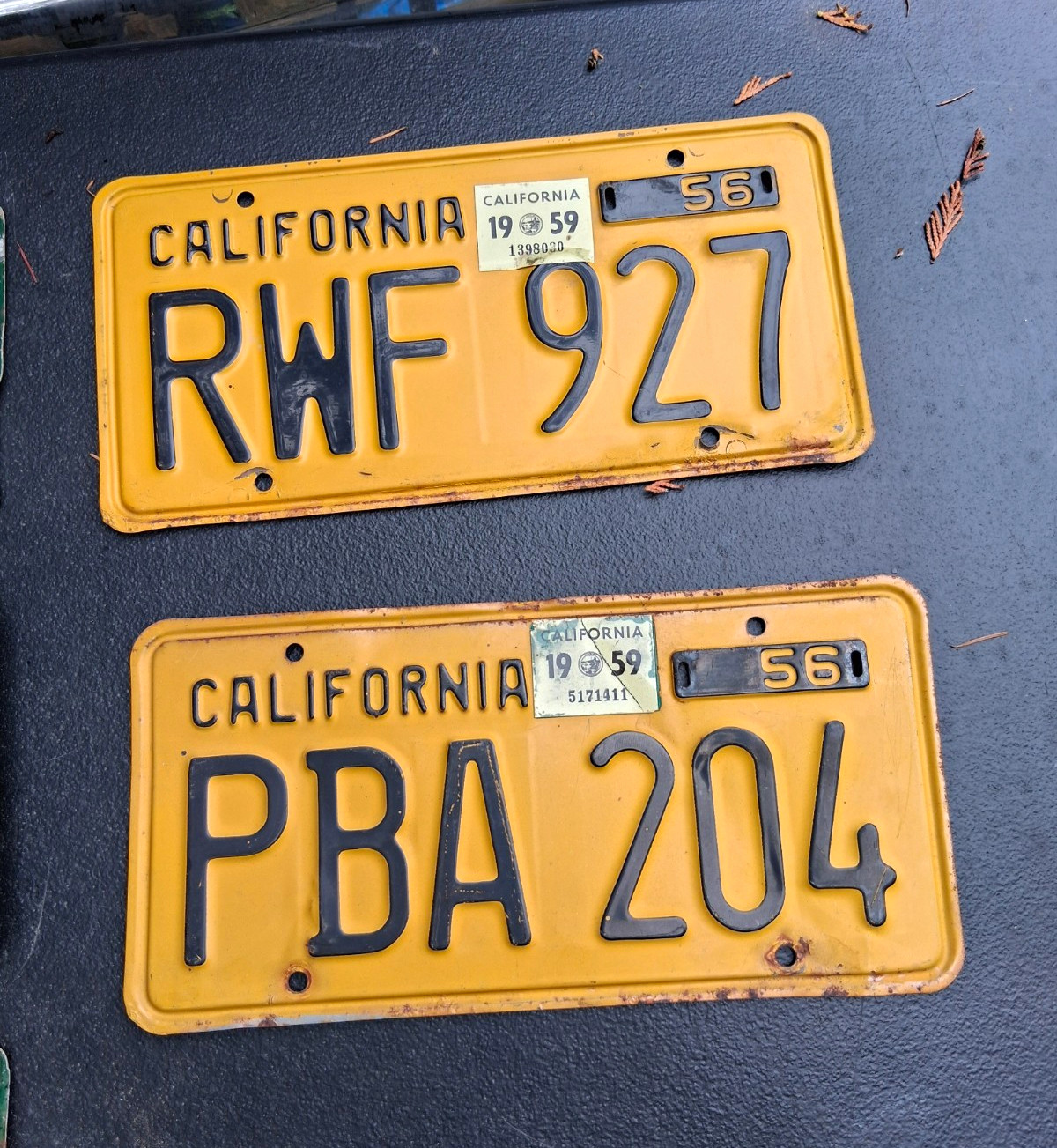 1956 California License Plates Lot of 2 Yellow/Black RWF 927 & PBA 204