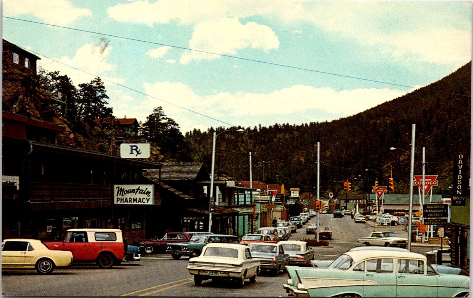 Postcard Evergreen Business District Street View Mountain Pharmacy Colorado D84