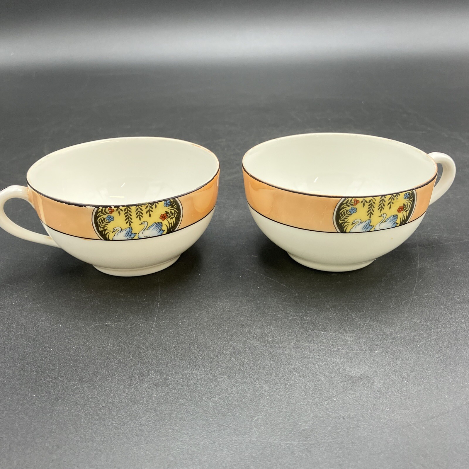 TWO Vintage SWAN Lusterware Iridescent Porcelain Tea Cups.  Rare.