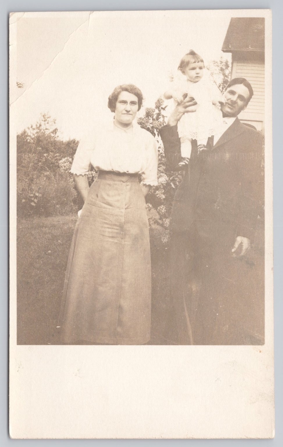 Vintage AZO RPPC Family Portrait Man Woman Baby 1900s Real Photo Postcard