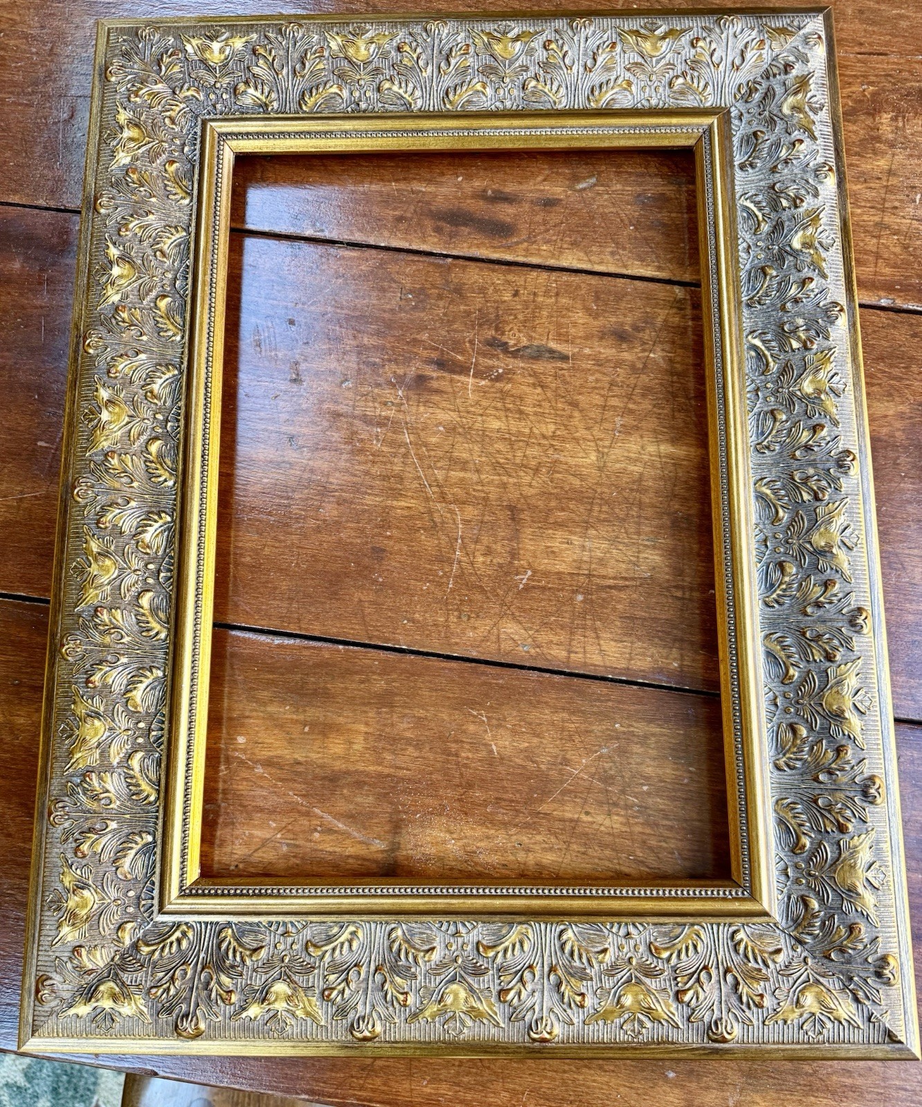 ORNATE GOLD TONE Picture Frame Measure’. 24 1/4 x 181/4”. ORNATE GOLD TONE Picture Frame Measure’. 24 1/4 x 181/4”.