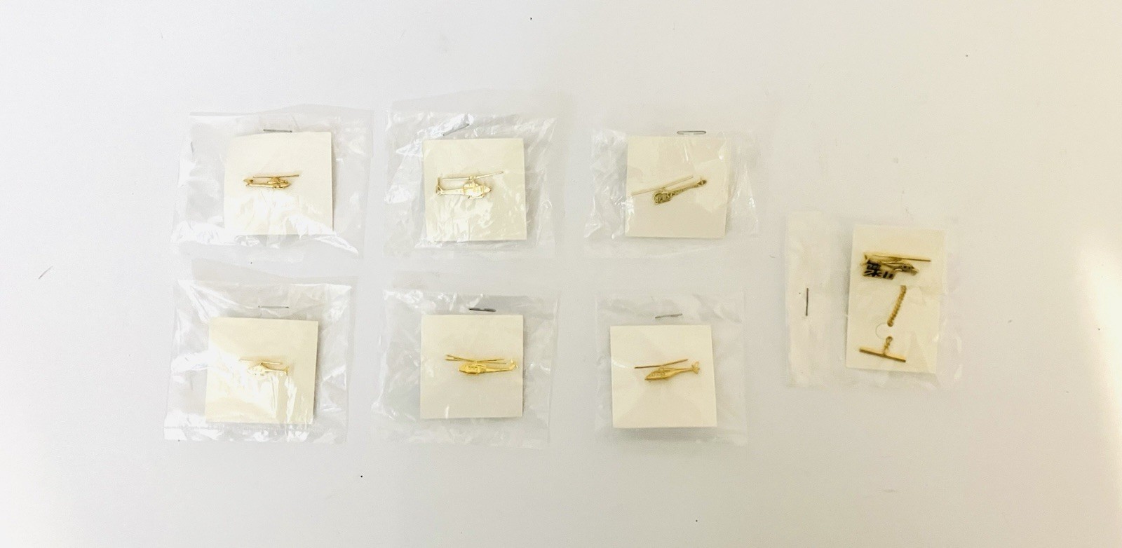 Lot Of 7 Vintage 1980's Bell Textron Gold Tone Helicopter Lapel Pins Lot Of 7 Vintage 1980's Bell Textron Gold Tone Helicopter Lapel Pins