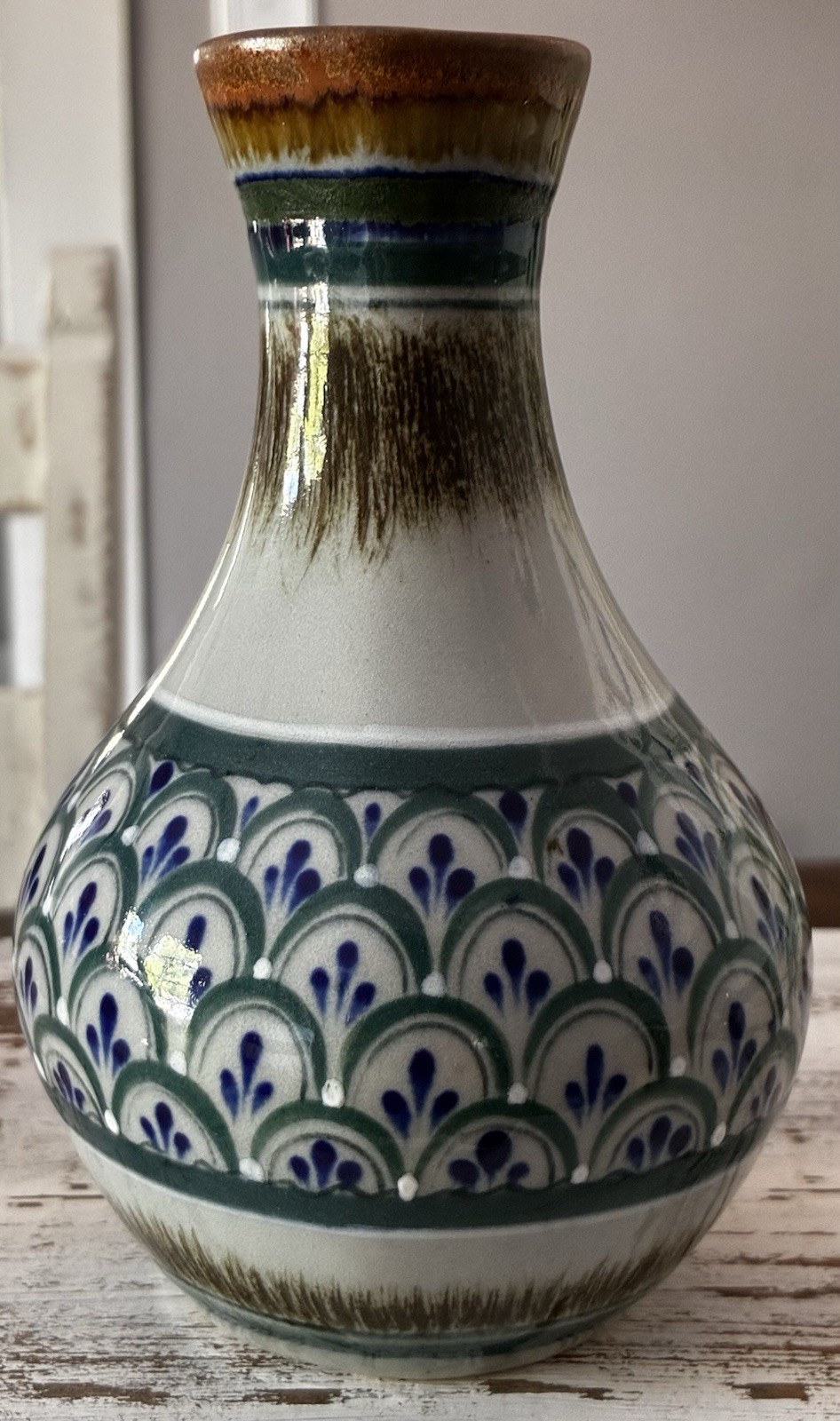 Erandi Tonala Mexican art pottery vase with hand-painted motifs. Erandi Tonala Mexican art pottery vase with hand-painted motifs.