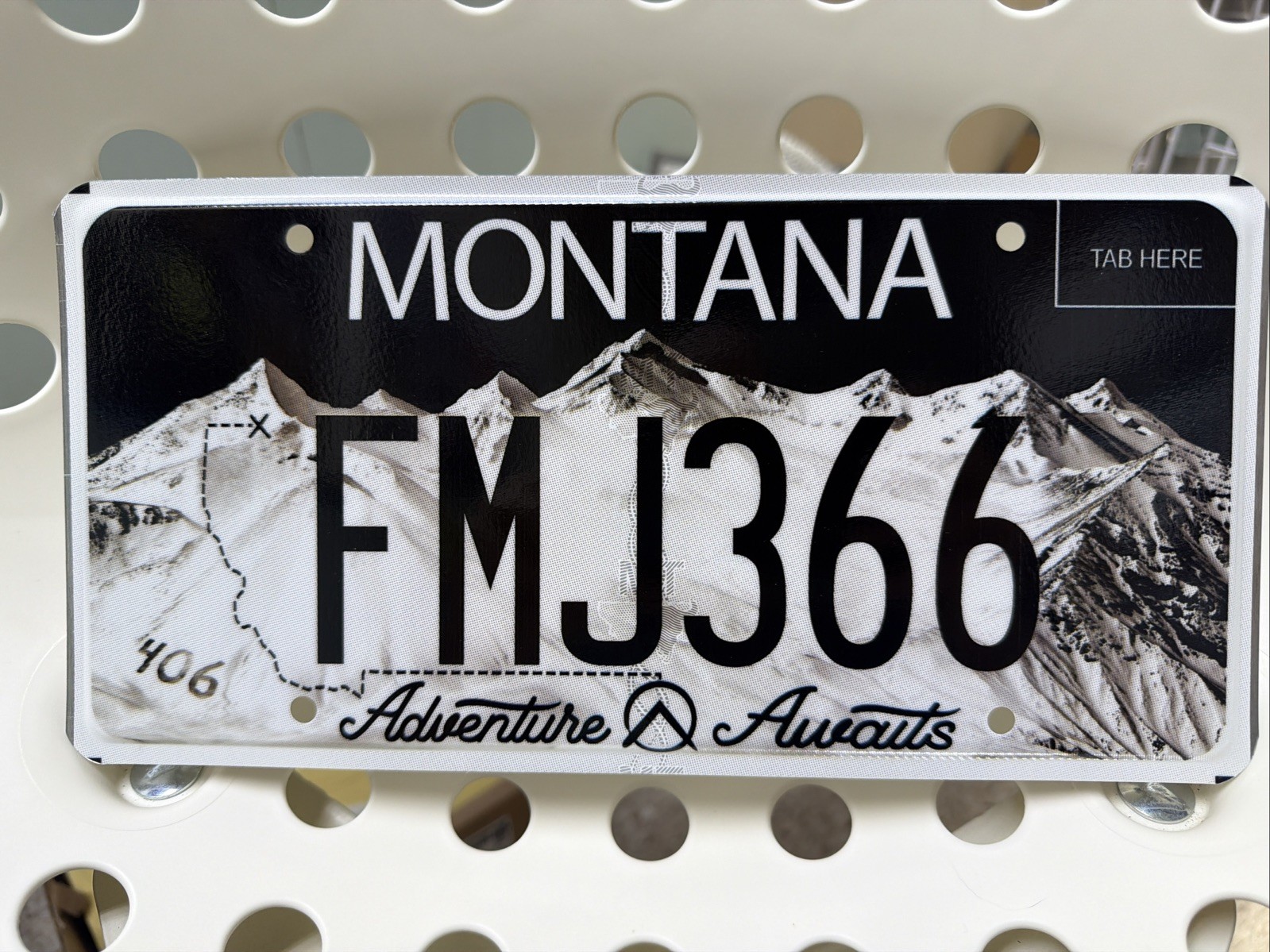 ADVENTURE AWAITS ROCKY MOUNTAIN MEDICAL FOUNDATION MONTANA LICENSE PLATE