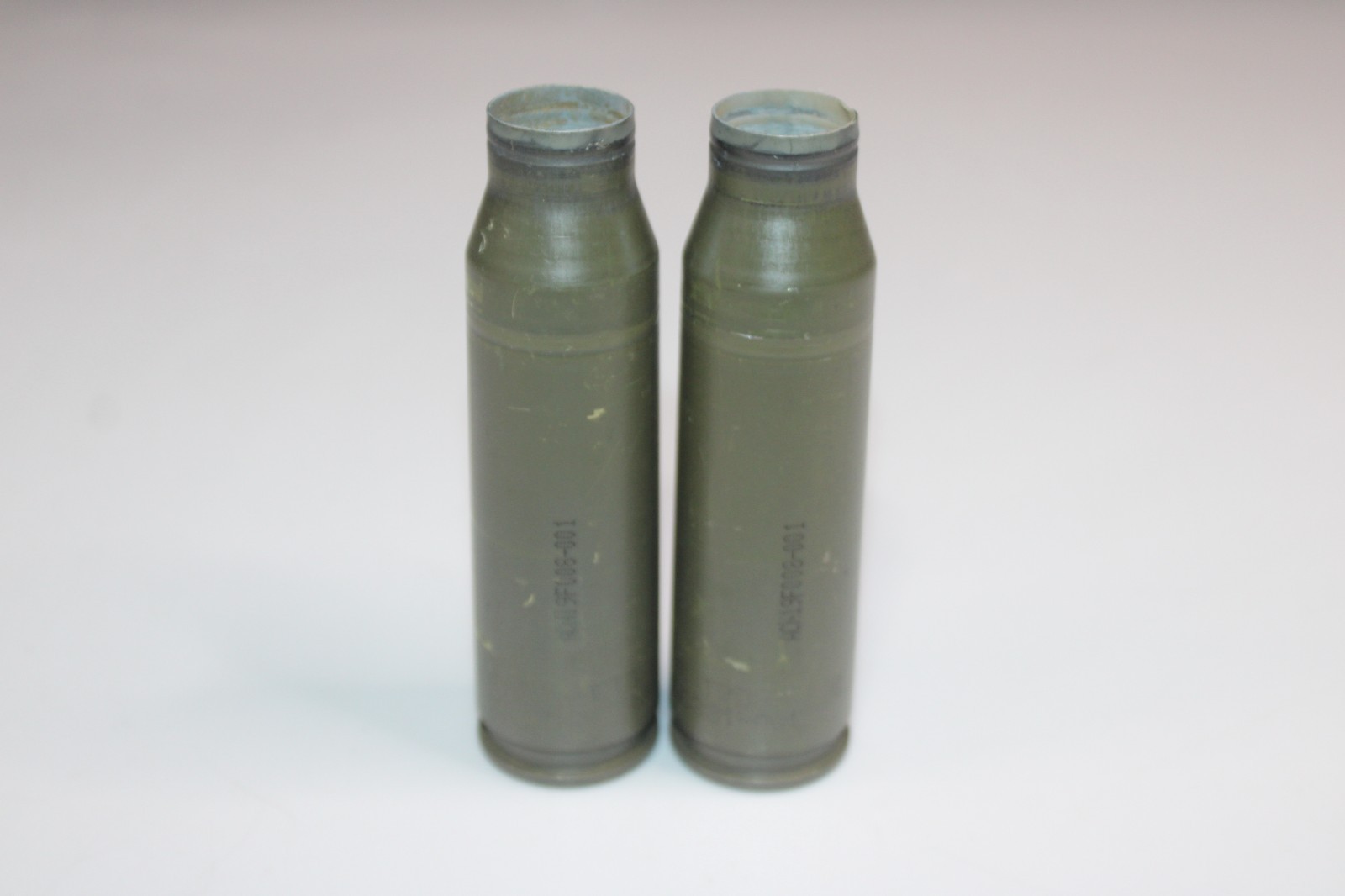2 empty 25 mm Fired Shell Case casings PAPERWEIGHTS display