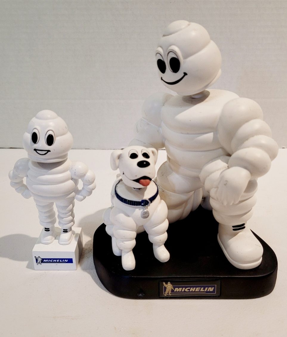 MICHELIN MAN WITH DOG-7 IN TALL- AND RETIRED FIGURE 4 3/4\