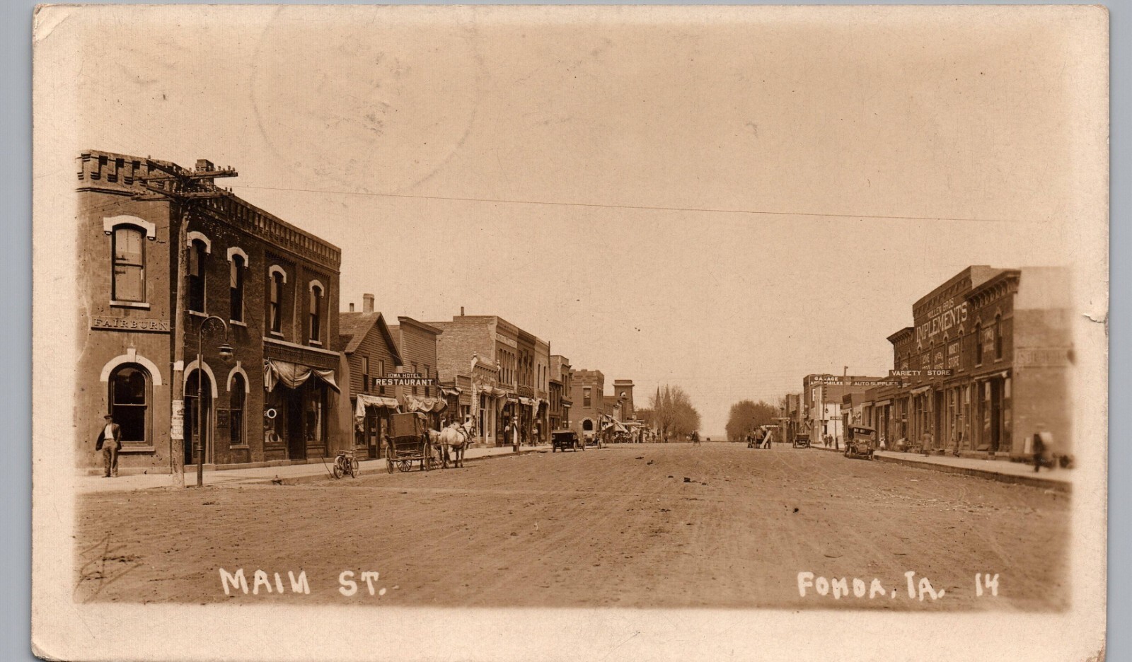 MAIN STREET c1910 fonda ia real photo postcard rppc antique iowa dirt road wagon