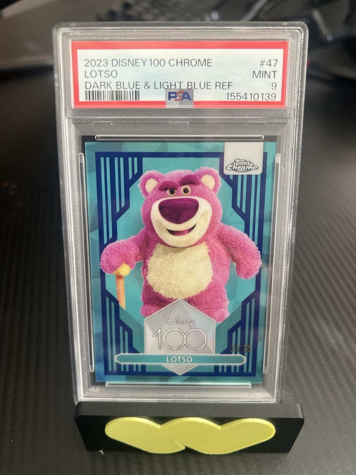 PSA 9 2023 Topps Chrome Disney 100 Lotso Dark and Light Blue Refractor #/75