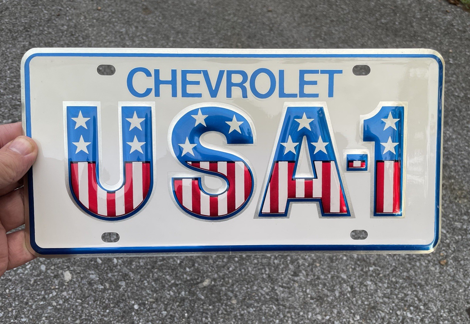 Genuine Vintage NOS 1970s Chevrolet USA-1 License Plate Small Hole New Old Stock Genuine Vintage NOS 1970s Chevrolet USA-1 License Plate Small Hole New Old Stock