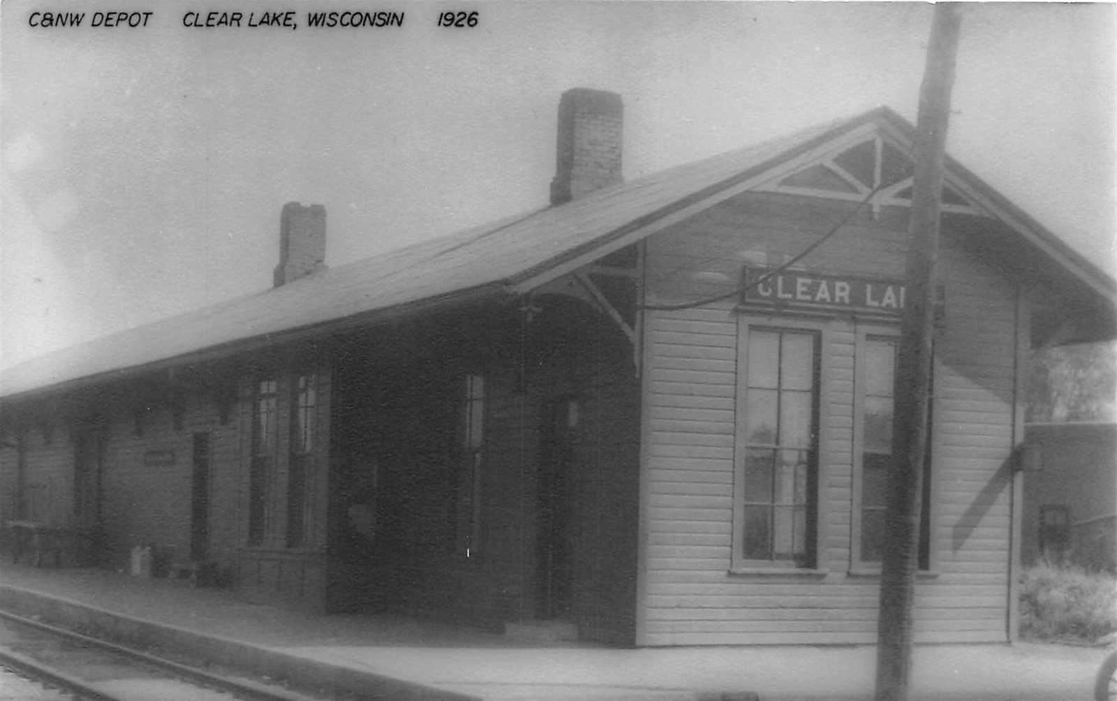 J33/ Clear Lake Wisconsin RPPC Postcard c1950s C&NW Railroad Depot  296