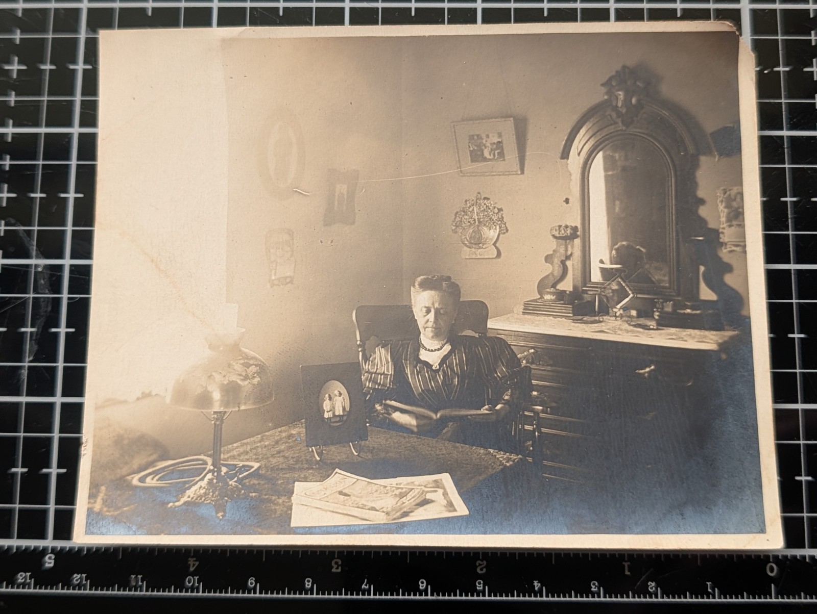  Victorian woman at desk reading with photo antique black and white photo 