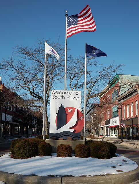 Photo:South Haven Michigan 2020s Welcome Sign Lake Michigan Flags Downtown