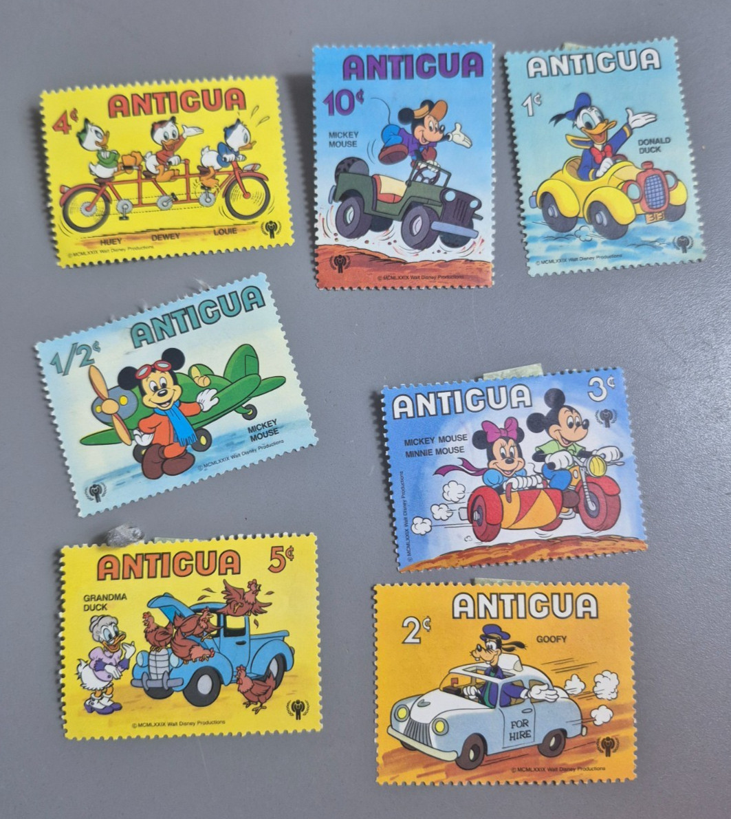 Vintage Lot of 7 Antigua Disney Mickey & Friends Stamps 1979 Hinged Unused Vintage Lot of 7 Antigua Disney Mickey & Friends Stamps 1979 Hinged Unused