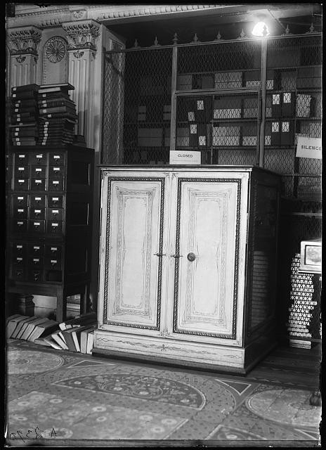 Photo:Library Interior Closed Sign 1900s Cabinet Card File Drawers Clock