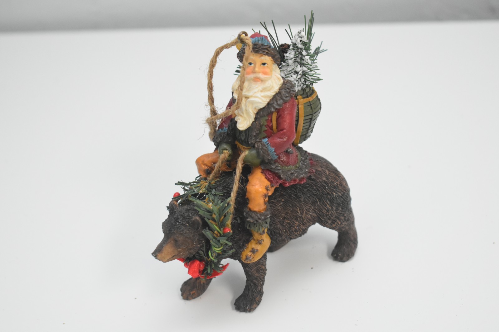 Santa Riding Brown Bear Resin Figurine 4.5\