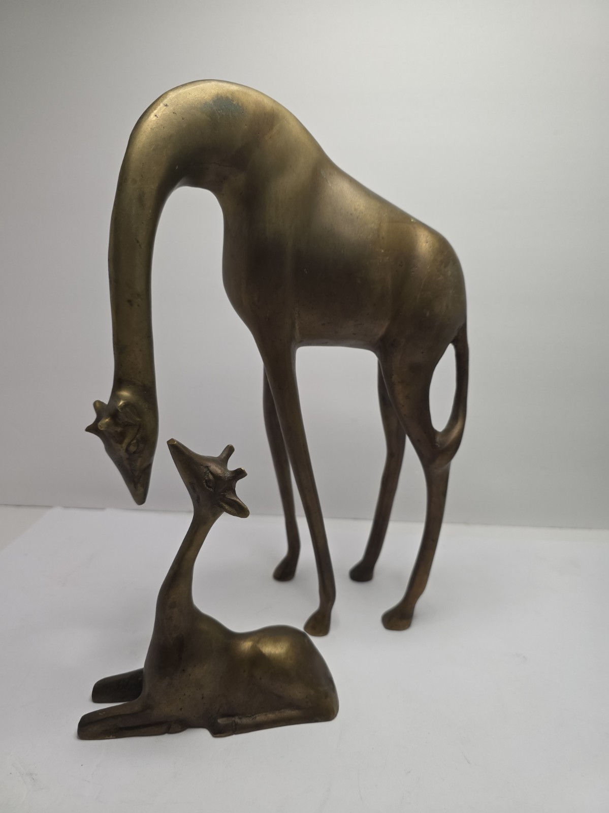 Vintage Solid Brass Giraffe Mother and Baby Calf Figurine Set MCM Read. Vintage Solid Brass Giraffe Mother and Baby Calf Figurine Set MCM Read.