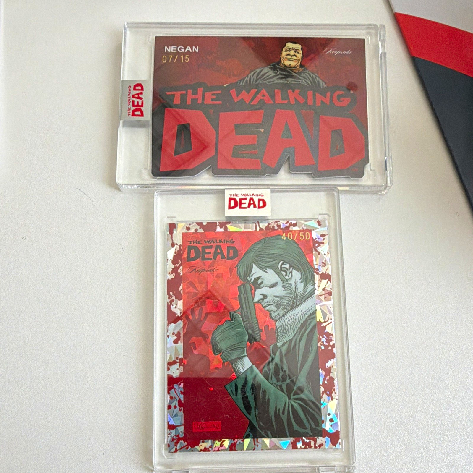 The Walking Dead Keepsake #31 Rick Grimes #52 Negan Numbered Card Lot (2) The Walking Dead Keepsake #31 Rick Grimes #52 Negan Numbered Card Lot (2)