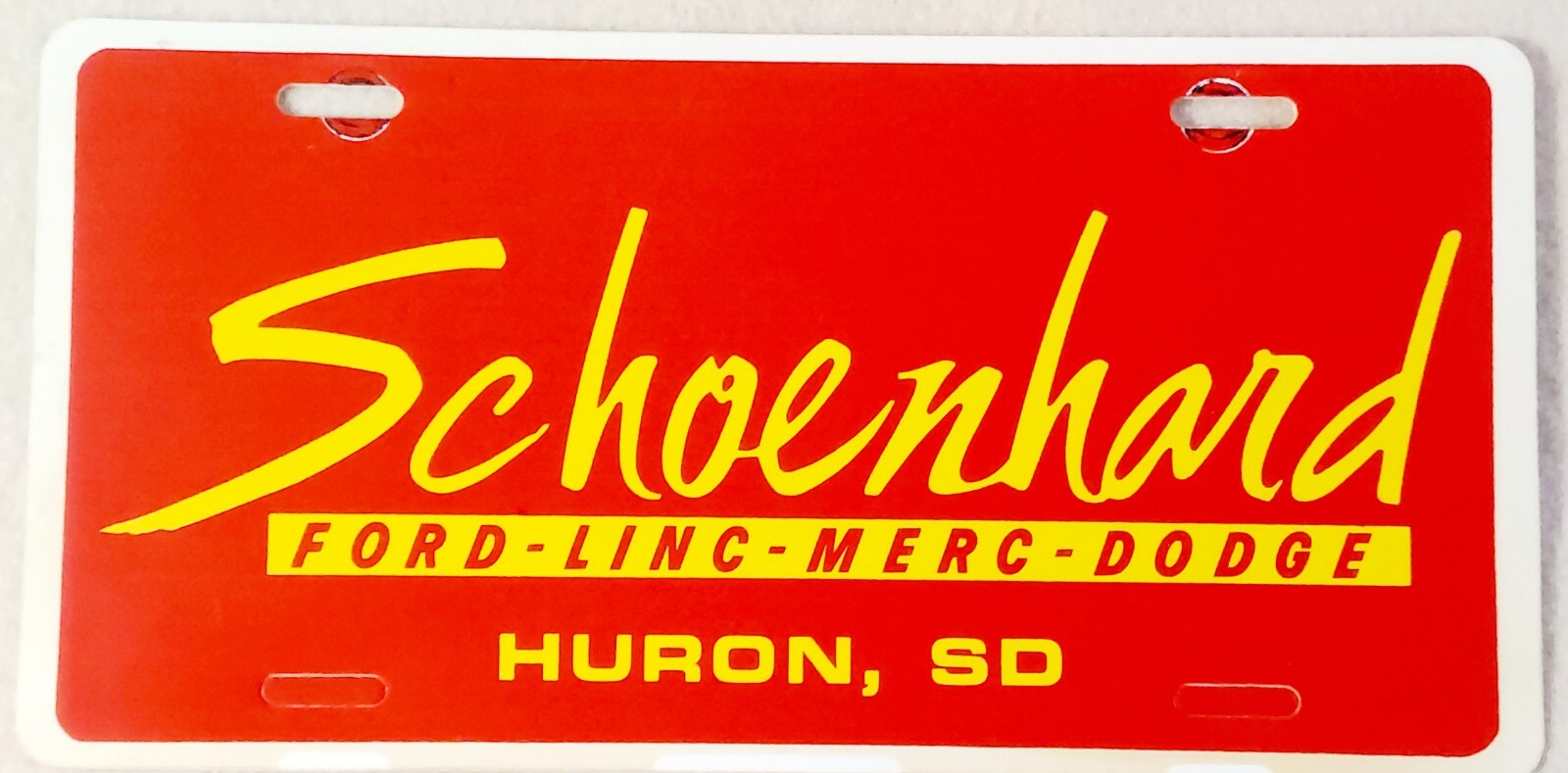 SCHOENHARD FORD - LINC - MERC - DODGE HURON SOUTH DAKOTA Booster License Plate SCHOENHARD FORD - LINC - MERC - DODGE HURON SOUTH DAKOTA Booster License Plate
