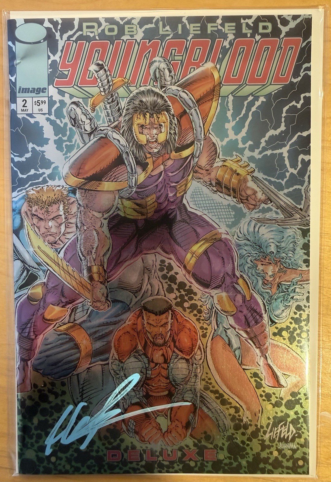 Youngblood Deluxe #2 Cover A FOIL Variant Signed by Rob Liefeld NM+ *CGC Worthy* Youngblood Deluxe #2 Cover A FOIL Variant Signed by Rob Liefeld NM+ *CGC Worthy*