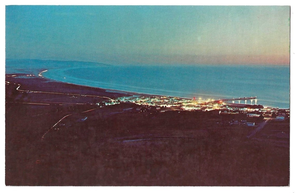 Pismo Beach California c1950's aerial night view, pier, Pacific Ocean