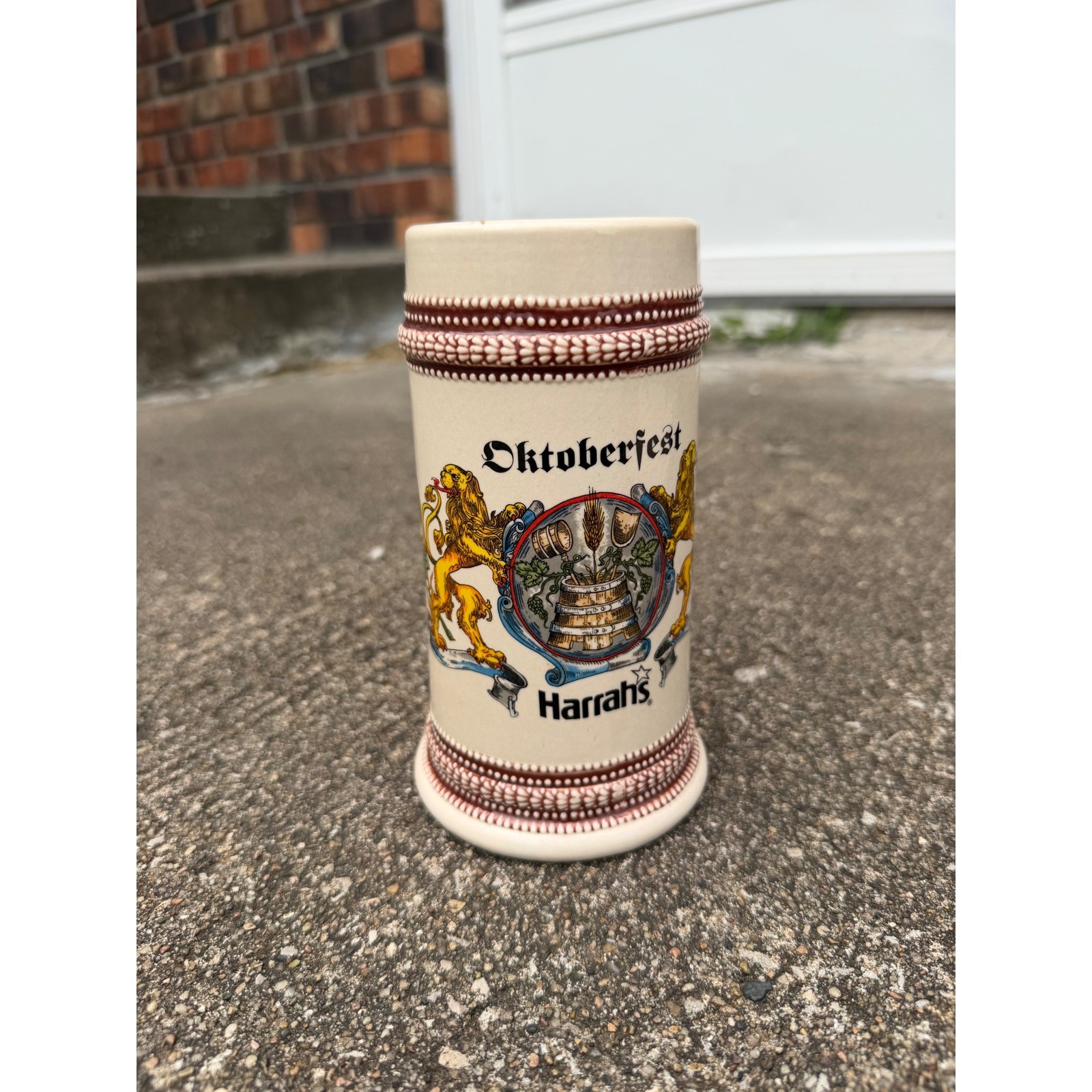 Vintage Harrahs Oktoberfest Ceramic Beer Stein Mug Lion Crest Cream Red