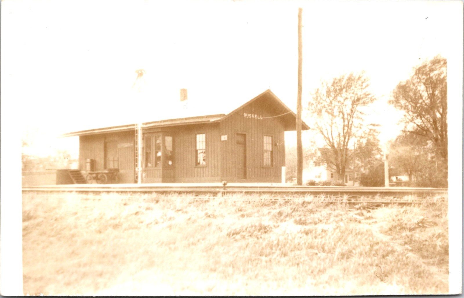 Real Photo Postcard Railroad Depot, Russell, Iowa - circa 1909