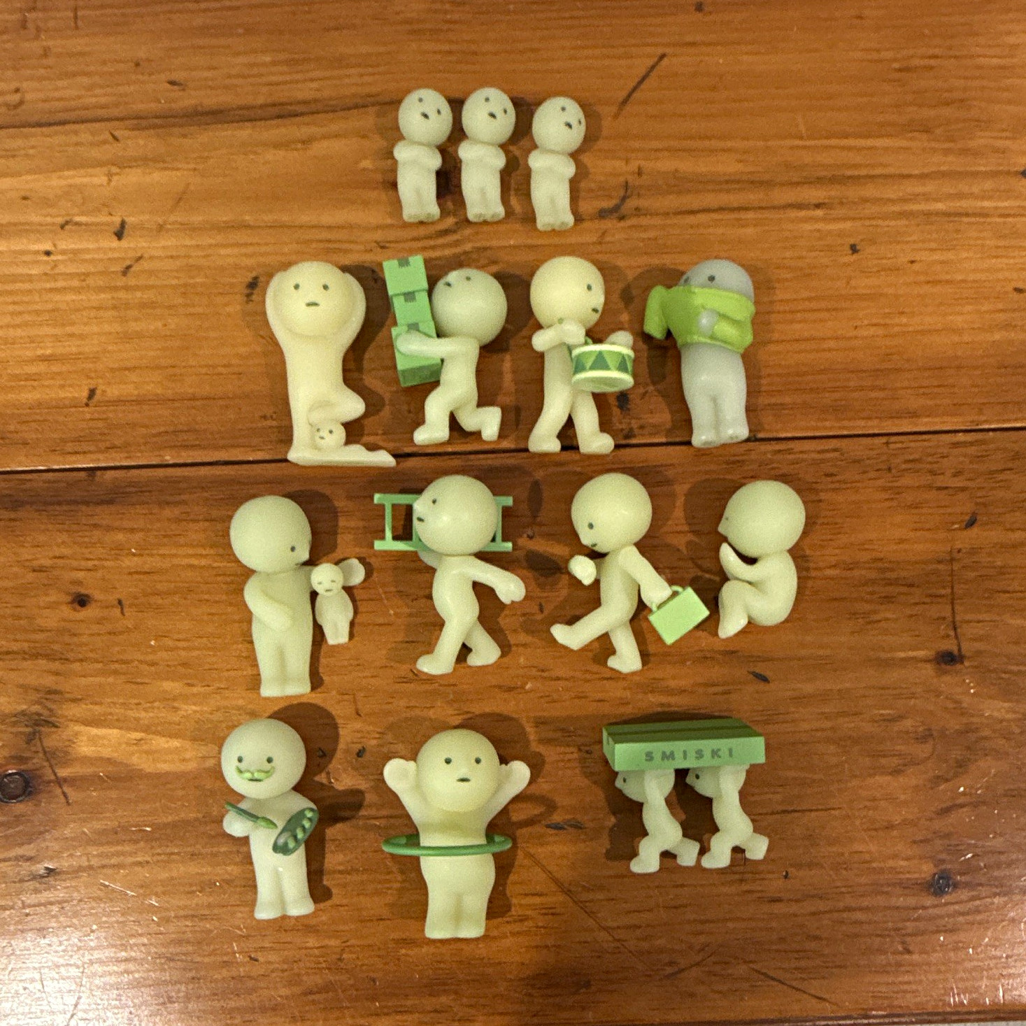 Smiski Glow in the Dark Mini Figurines Lot of 12 Green Plastic Smiski Glow in the Dark Mini Figurines Lot of 12 Green Plastic