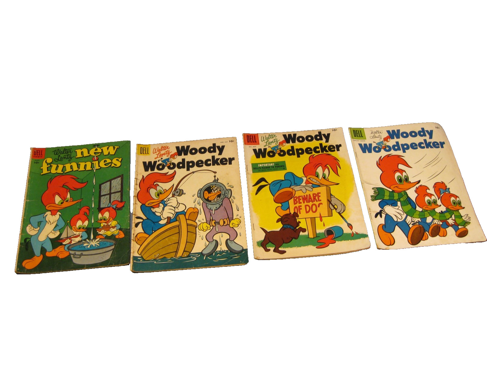 Lot of 4 Vintage 1955-56 Walter Lautz Woody Woodpecker Dell Comic Books Lot of 4 Vintage 1955-56 Walter Lautz Woody Woodpecker Dell Comic Books