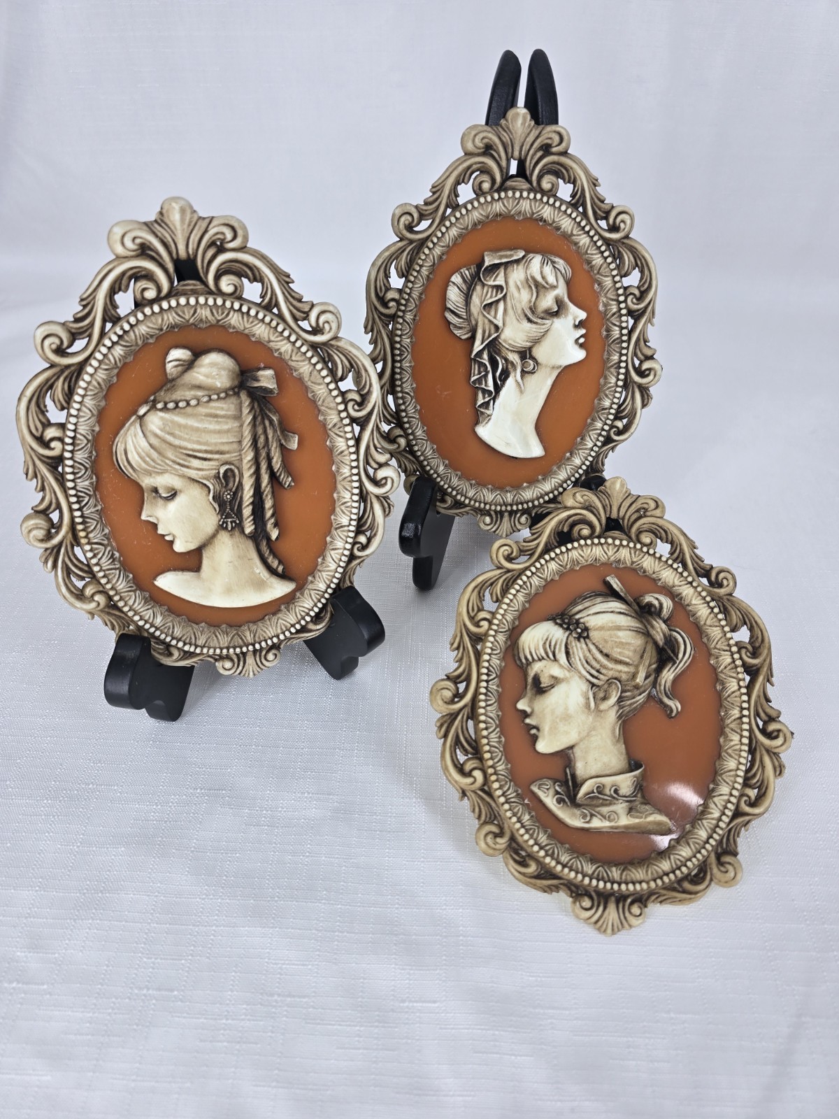 3 VIntage Victorian-style cameo wall plaques featuring Molded Profiles Of Women.