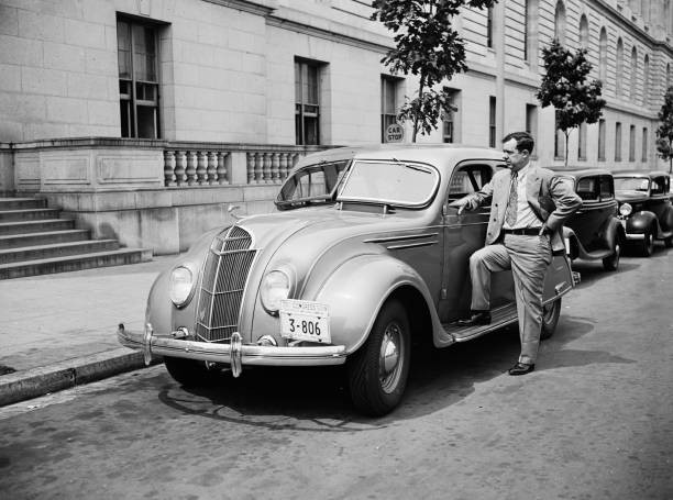 Senator Huey P Long standing by automobile ca 1935 Historic Old Photo