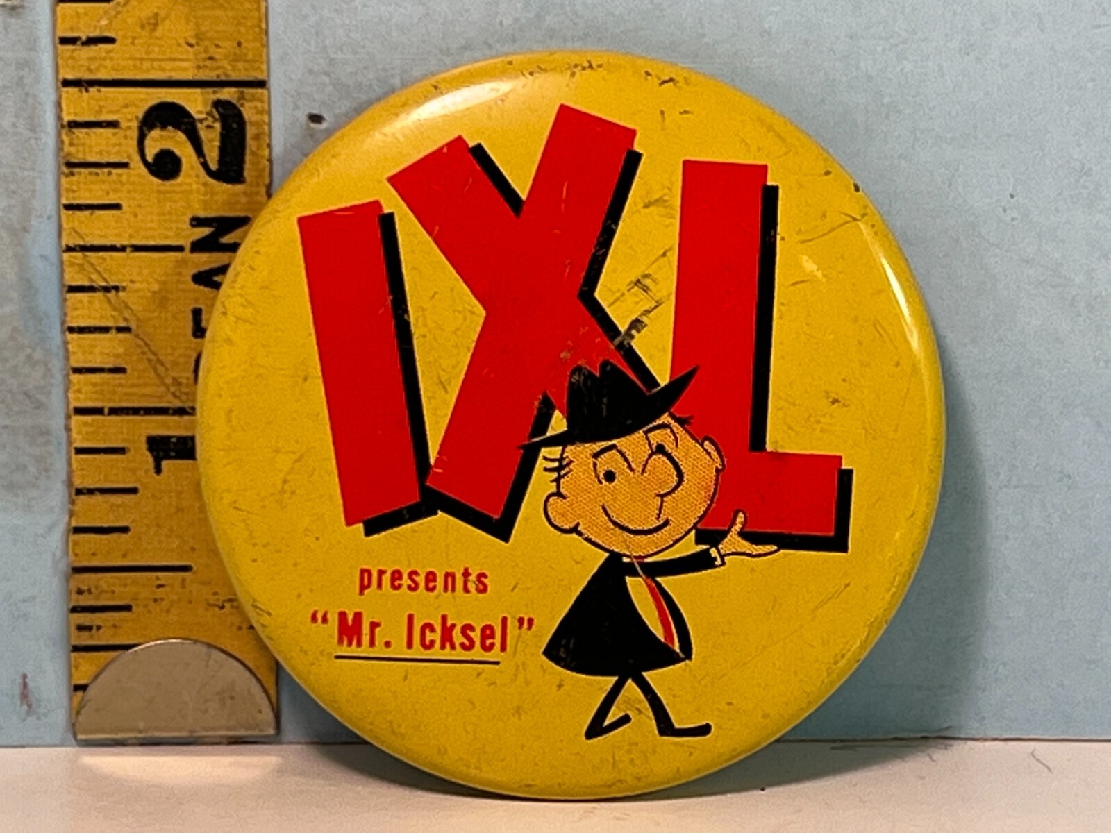 Vintage IXL Mr. Icksel Large Pinback Button Vintage IXL Mr. Icksel Large Pinback Button