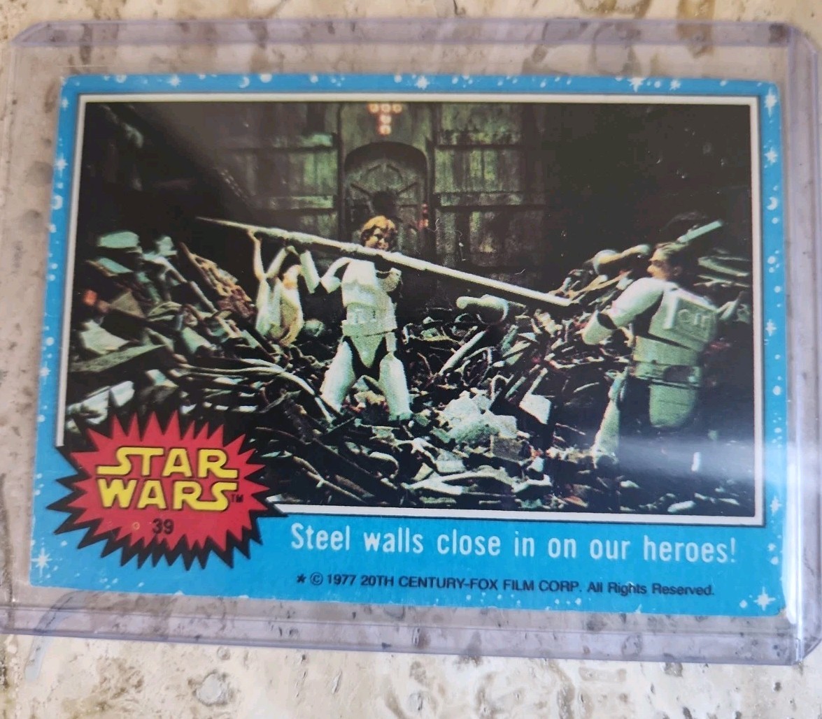 1977 STAR WARS SERIES ONE (BLUE) #39 STEEL WALLS CLOSE IN ON OUR HEROES Ungrade 1977 STAR WARS SERIES ONE (BLUE) #39 STEEL WALLS CLOSE IN ON OUR HEROES Ungrade