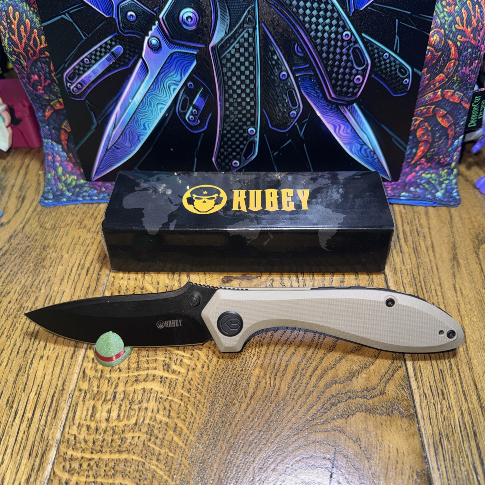 Kubey Ruckus KU314K.  AUS-10 3.5” Blade. G10. Front Flip. Thumb Stud. Liner Lock